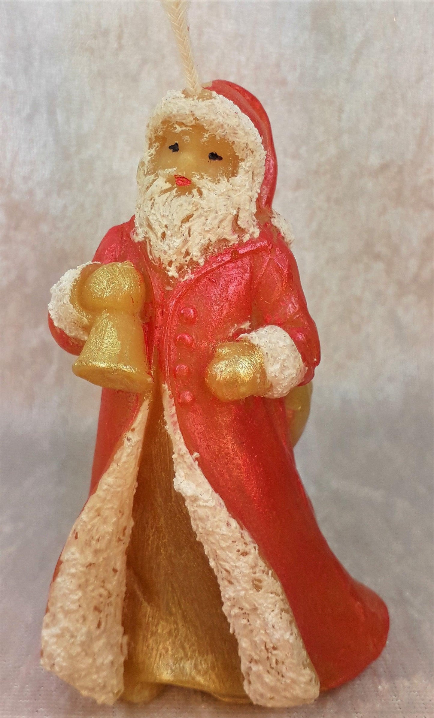 Bienenwachskerze Weihnachtsmann mit rotem Mantel 6 x 10 cm - Berliner Spezialitäten